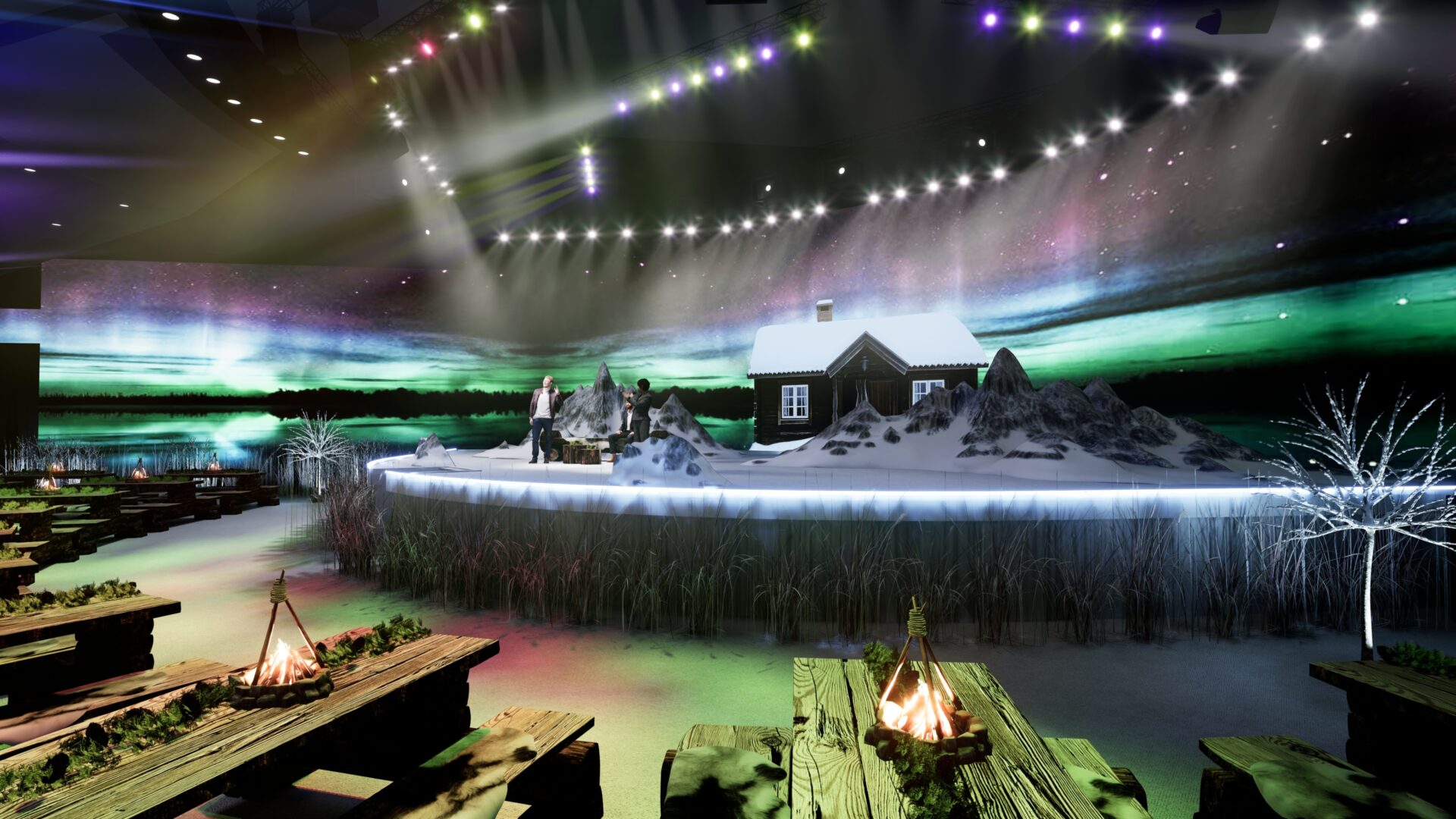 A stage set with a snowy cabin scene under northern lights, surrounded by benches and campfire props, with string lights overhead creating a magical, wintry atmosphere.